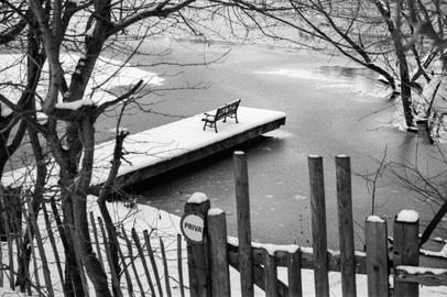 Snow-covered bench at a jetty. Snow-covered bench at a jetty.