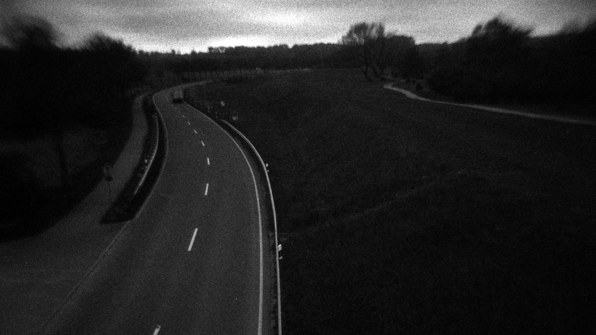 Dark contrasty black and white street view.