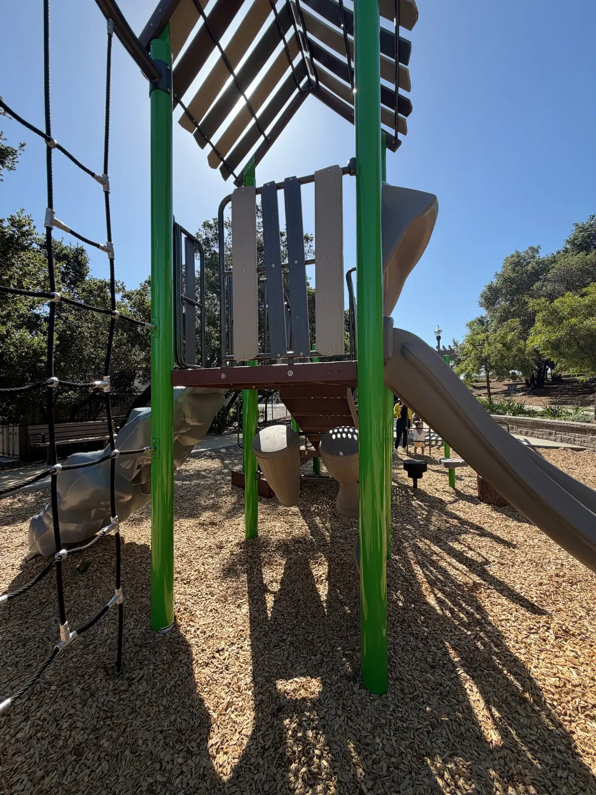 Bongo drums located underneath slide