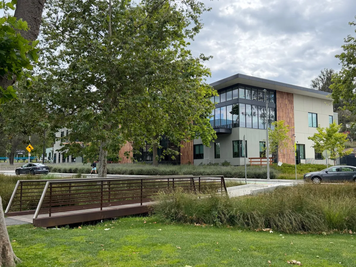 Across the bridge is the new Recreation and Aquatics center facility which includes both indoor and outdoor pool, splashpad, as well as a fitness center