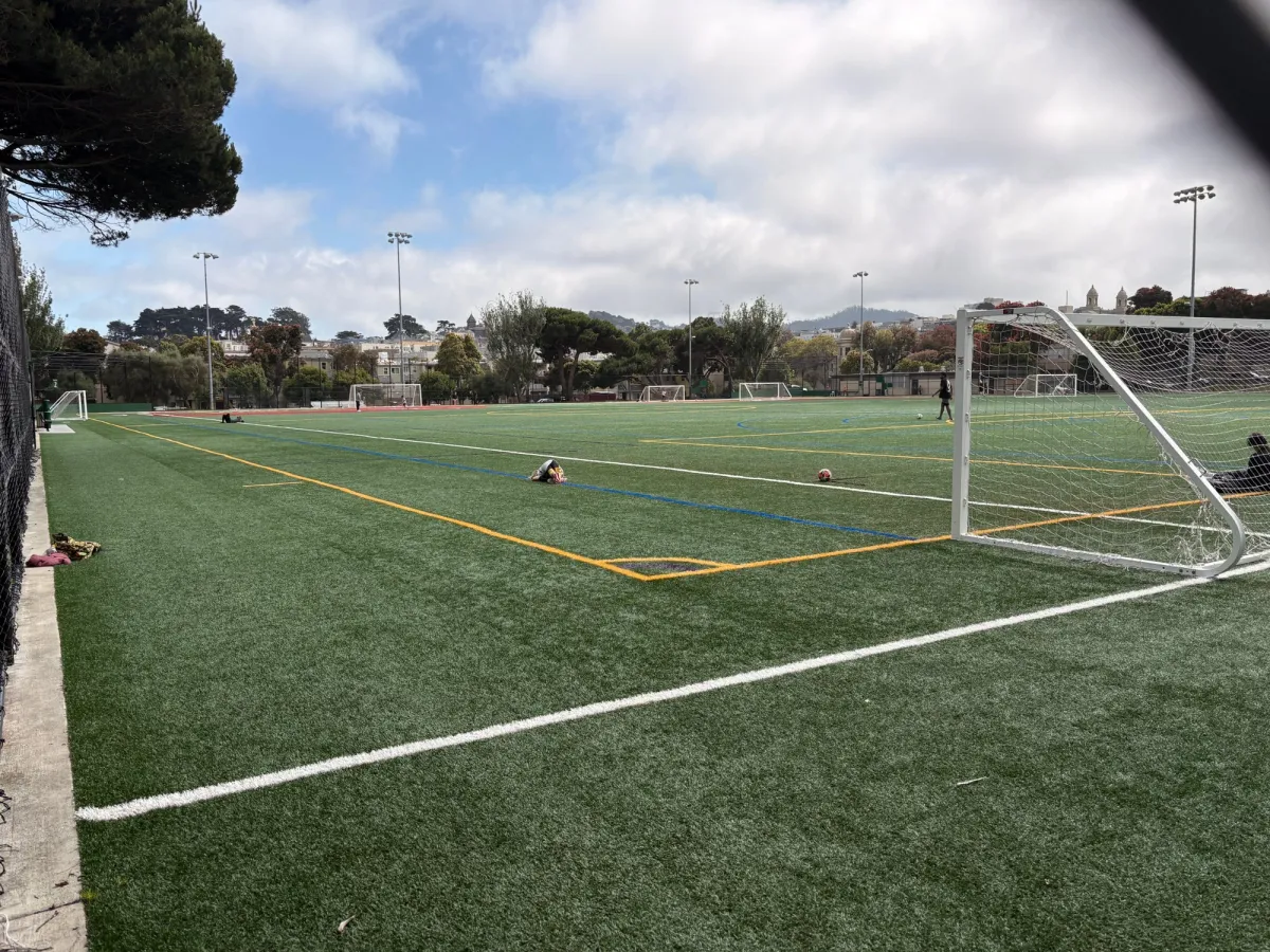 Playground borders a soccer field