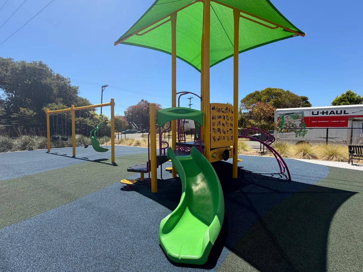 Small slide for the little ones with a little climbing ladder and ABC learning chart