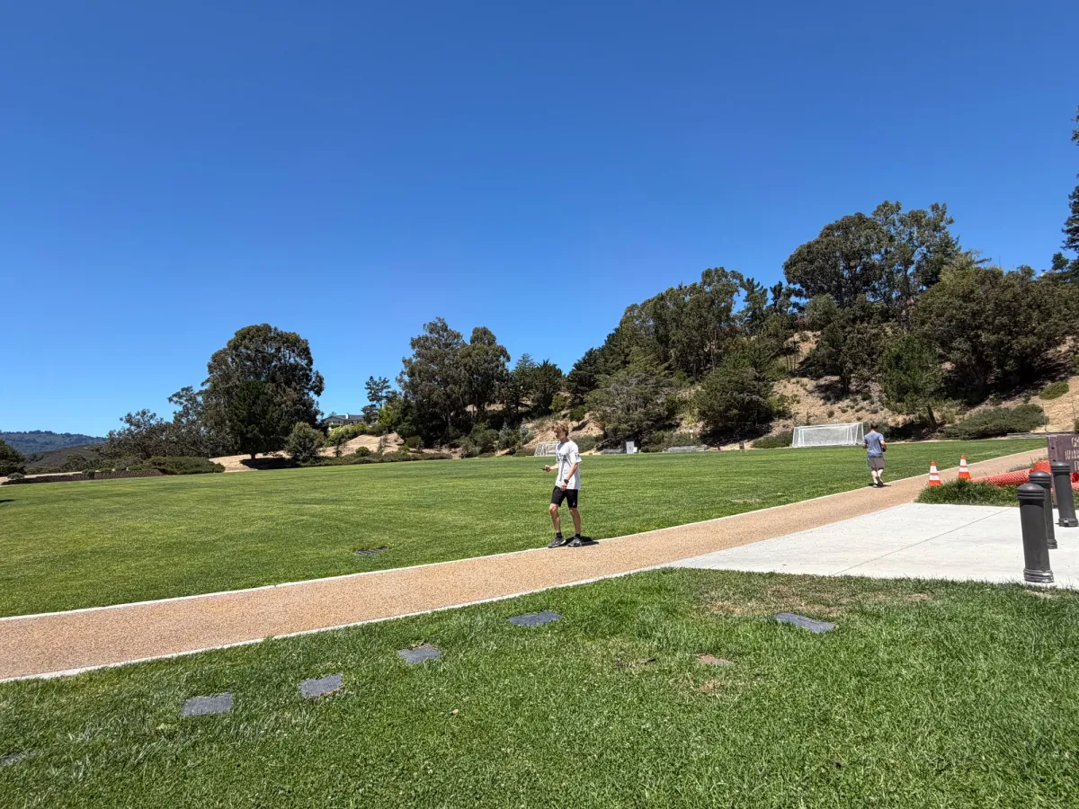 Jogging path around grass field