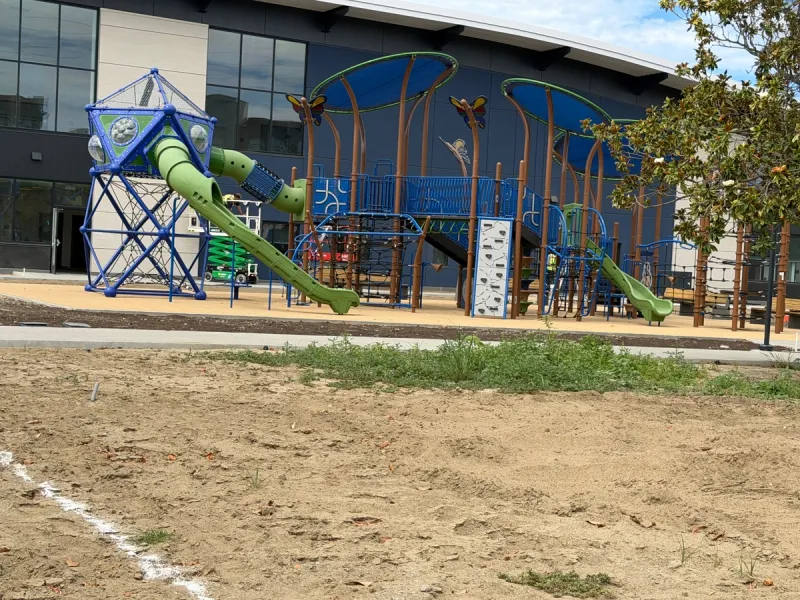 Playground is currently closed off for renovations. Photo taken from behind the fence