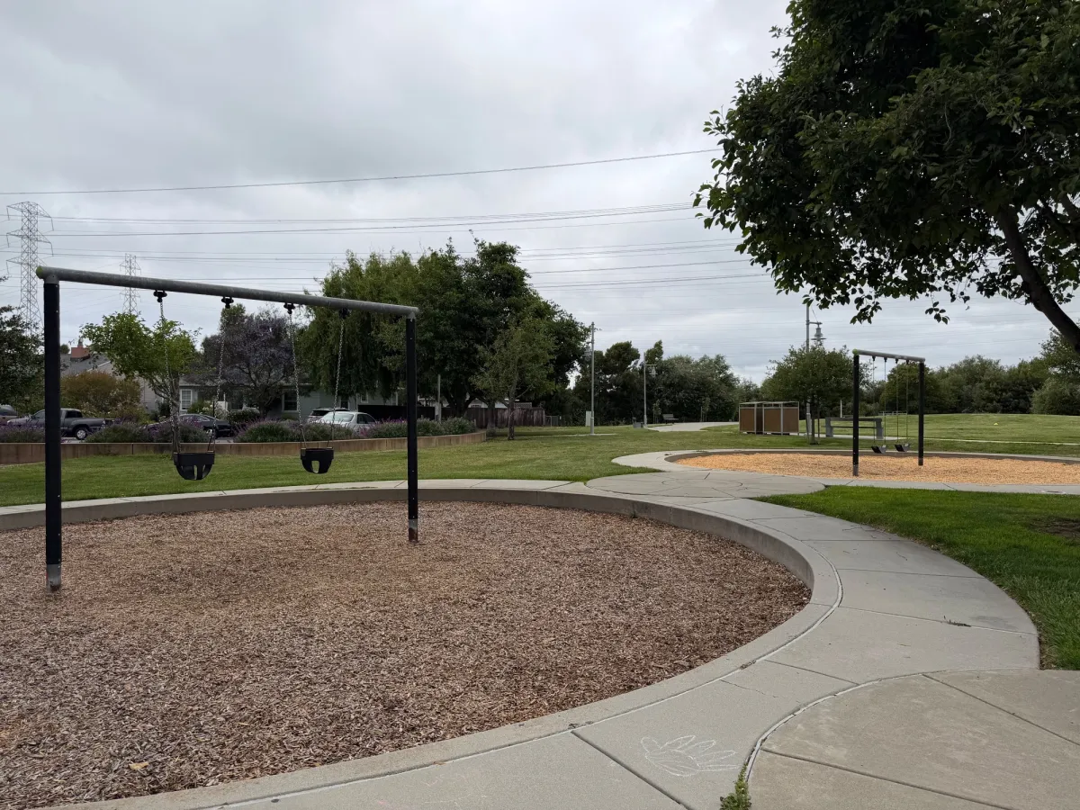 Toddler swing separated from 2 bigger child swings