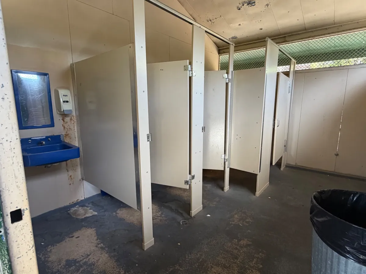 Bathroom facilities show a lot of wear