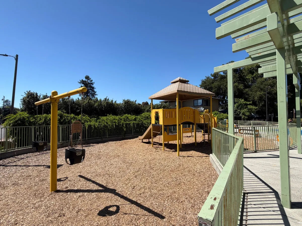 Toddler play area with 2 toddler swings