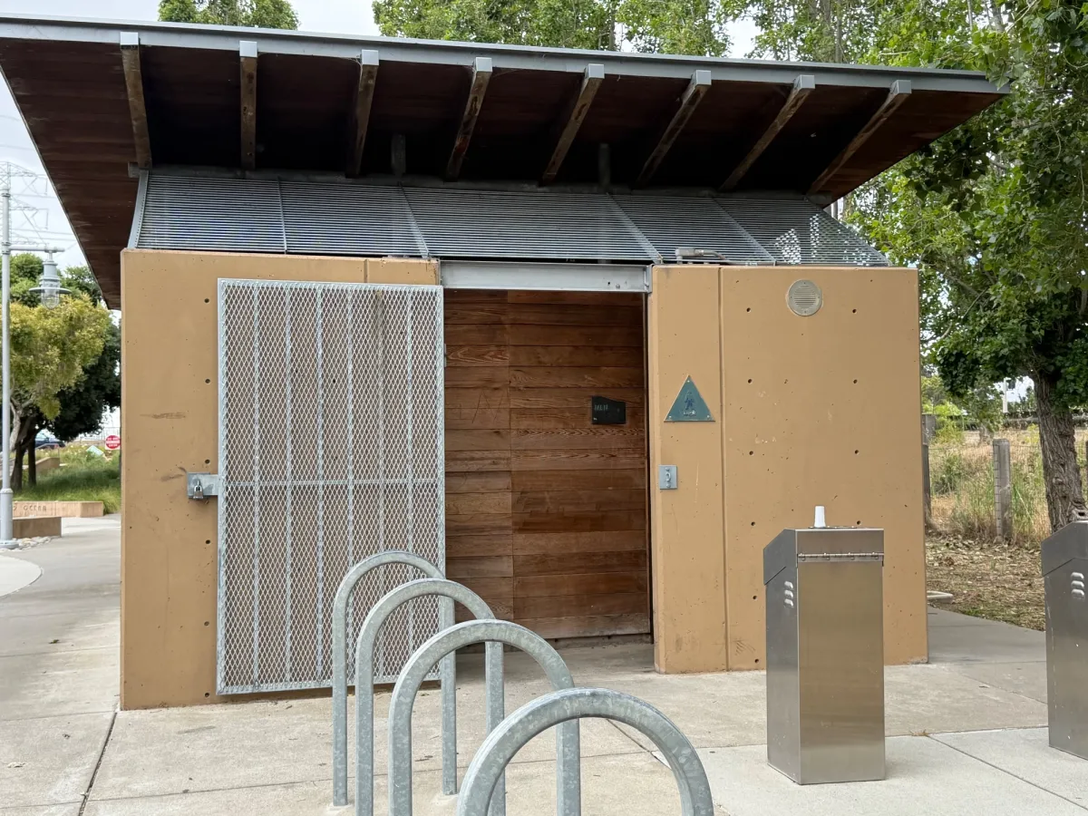 Bathroom facility has 2 stalls and includes a changing table