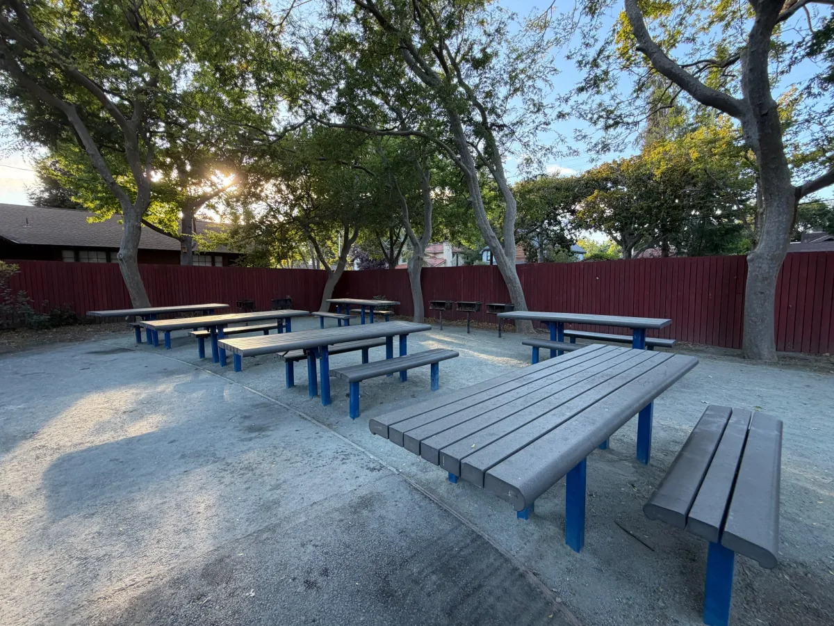 Reservable picnic area next to playground (outside fence)