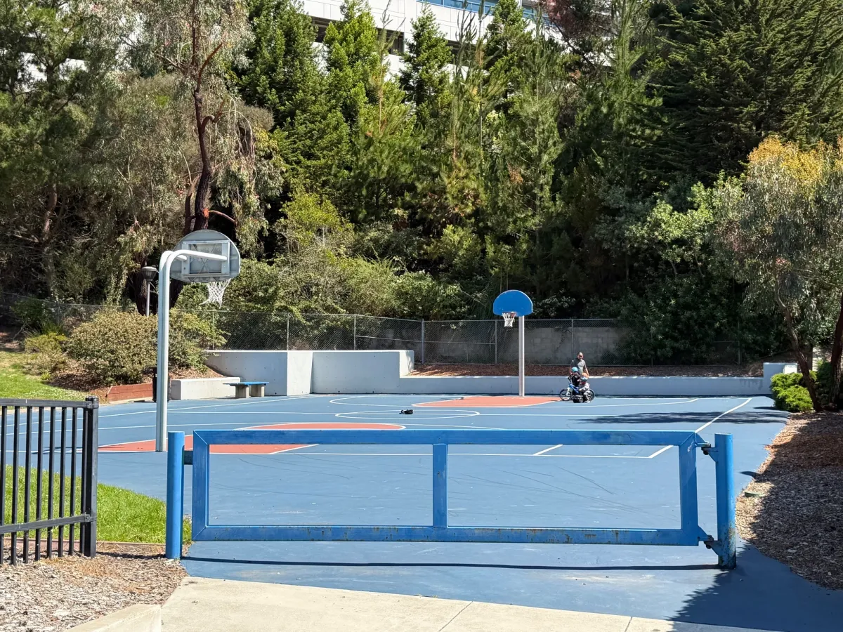Well maintained basketball court looks fairly new