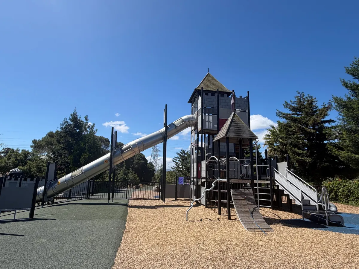 Castle play structure for big kids with big tunnel slides