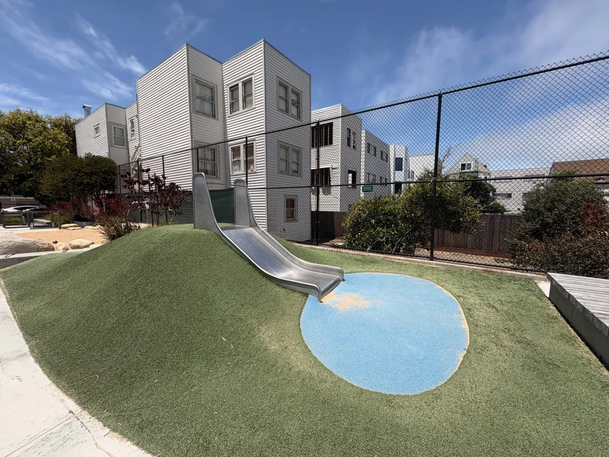Small slide built into a small hill