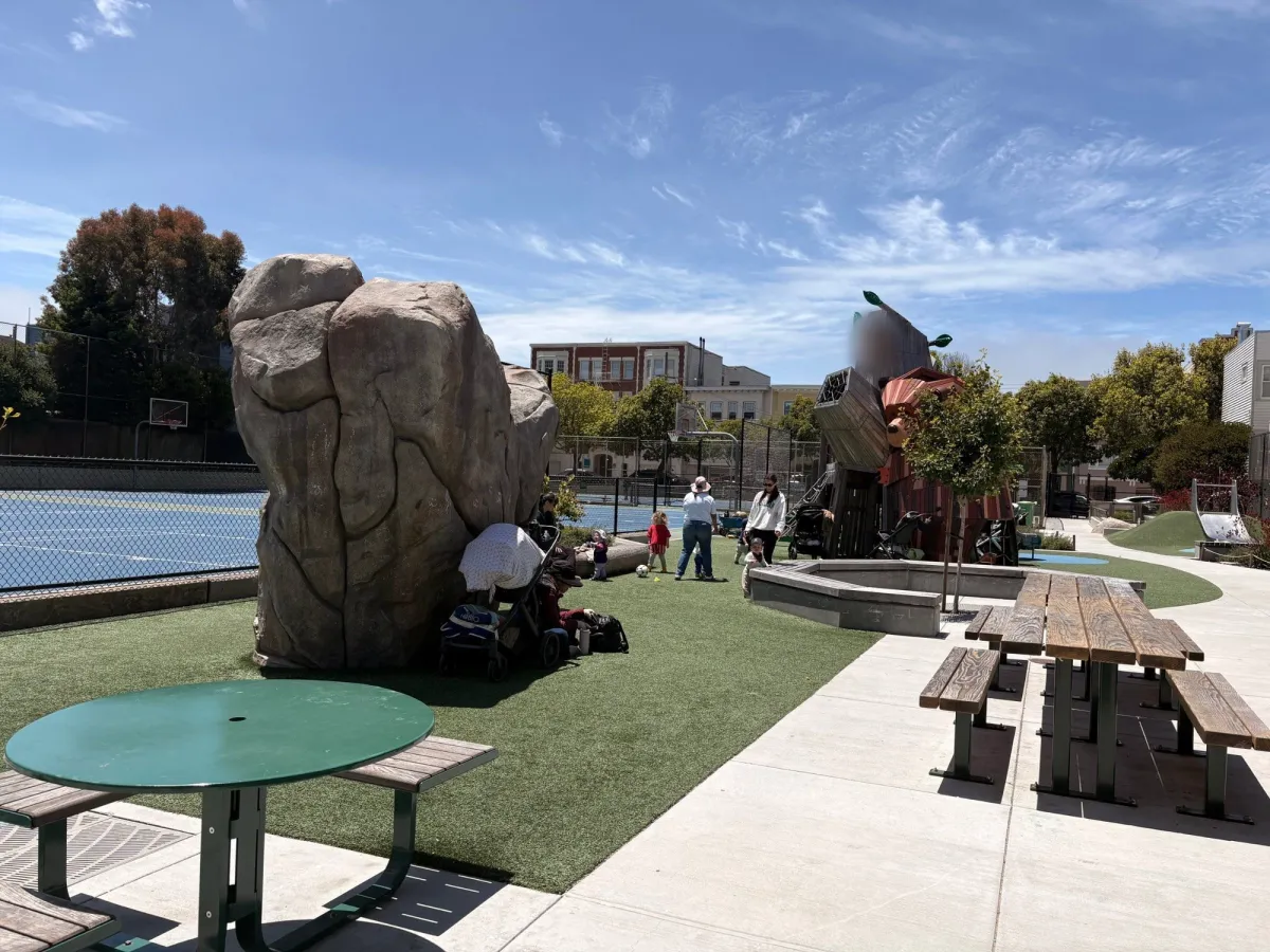 You can see the bear and the boulder in this picture