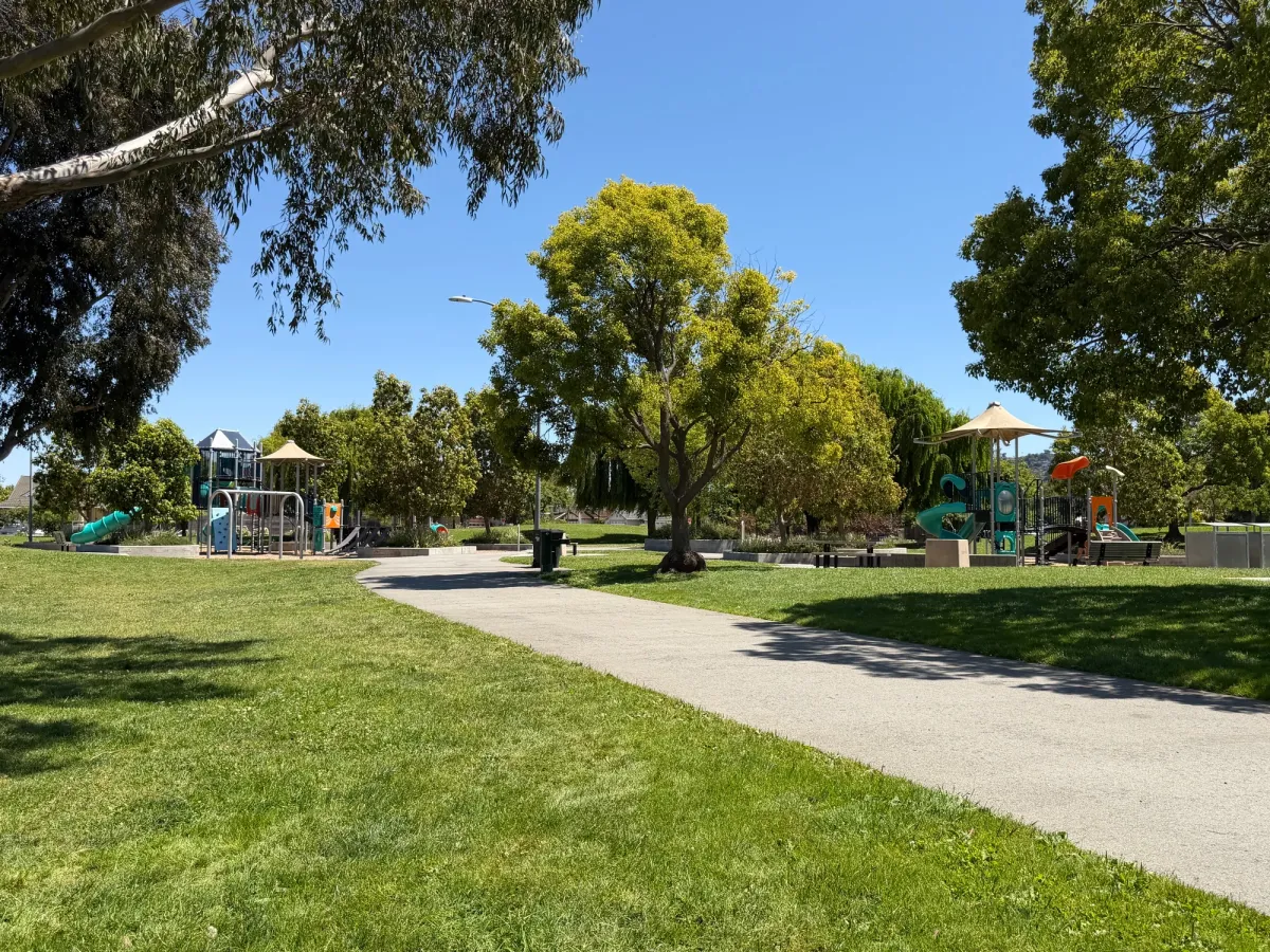 Panoramic shot of big kid and toddler playground