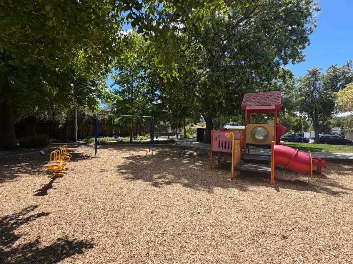 See saw, baby swings, and small slide