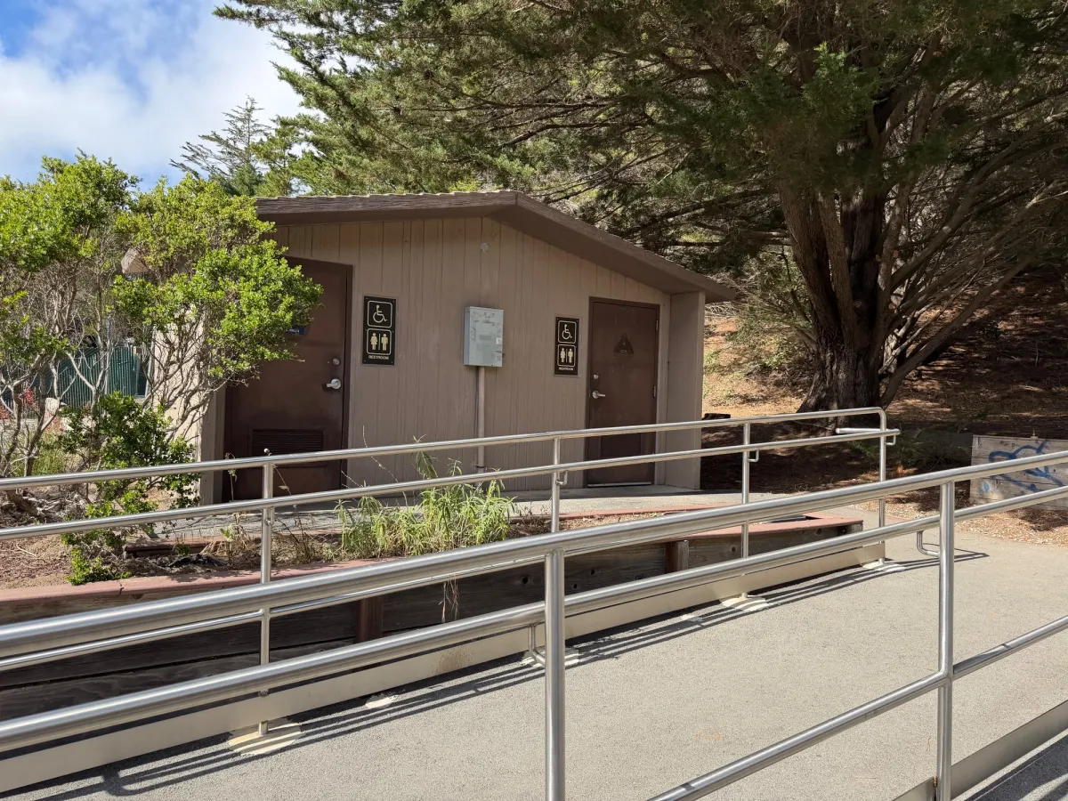 Ramp to restrooms next to parking lot