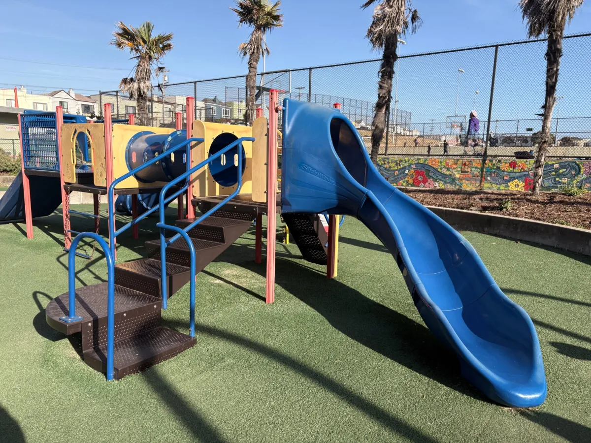 Toddler zone has medium and lower height slides, as well as a tunnel bridge
