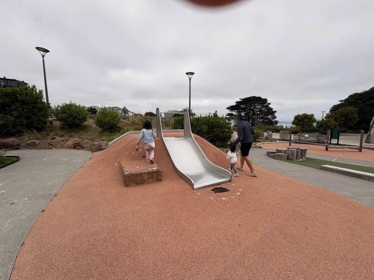 Low slides against a hill