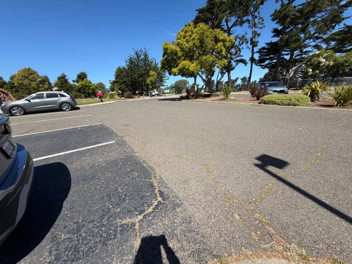 Large parking lot with plenty of spots available