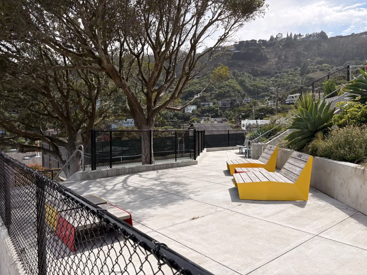 Picnic area is a stair climb above the playground