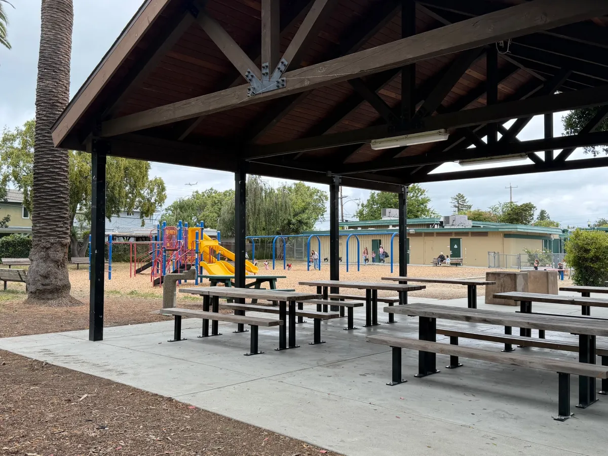 Picnic tables next to playground
