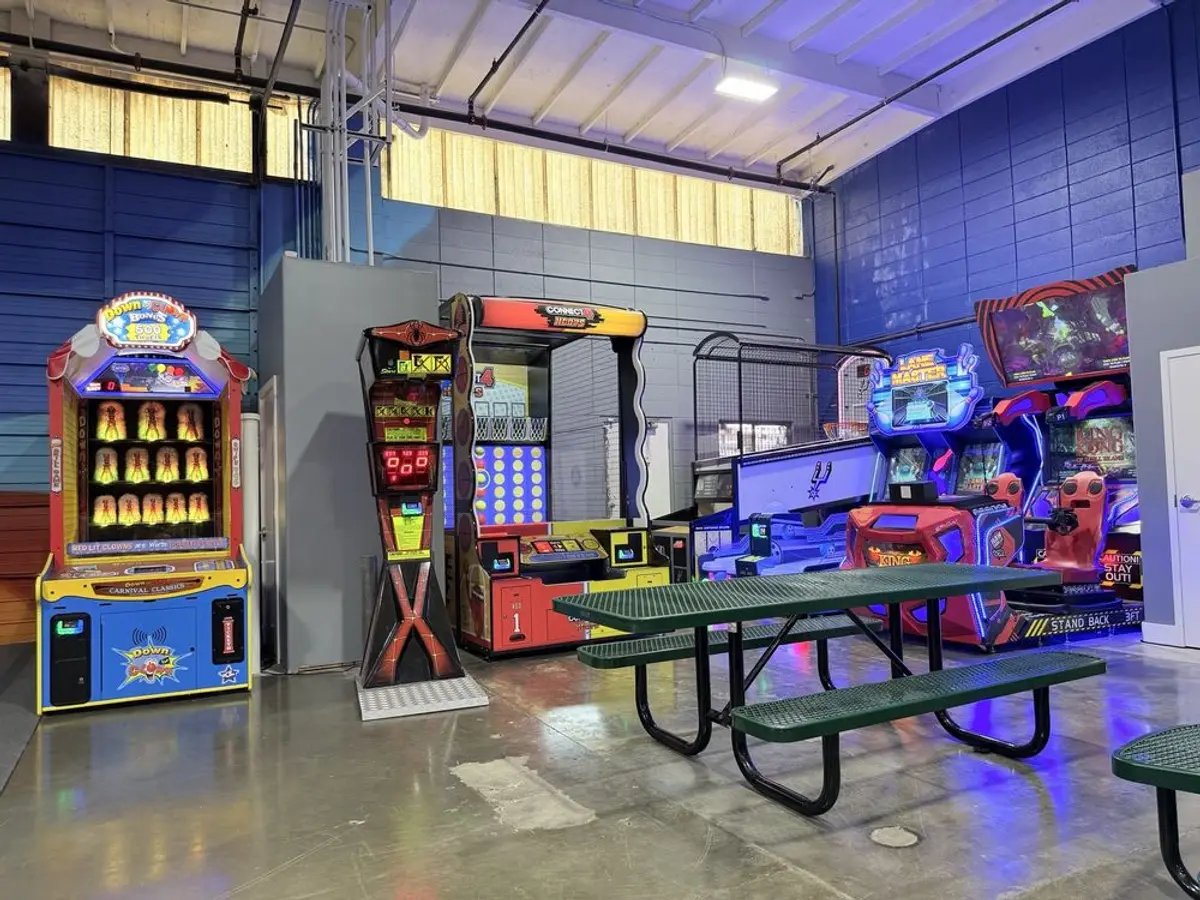 Arcade and picnic tables