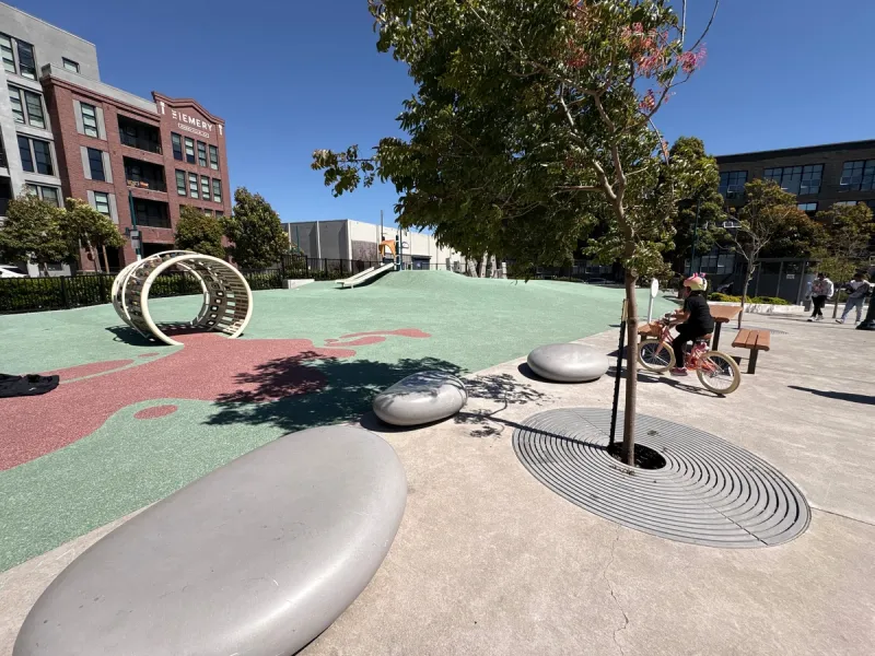 View of playground from swings