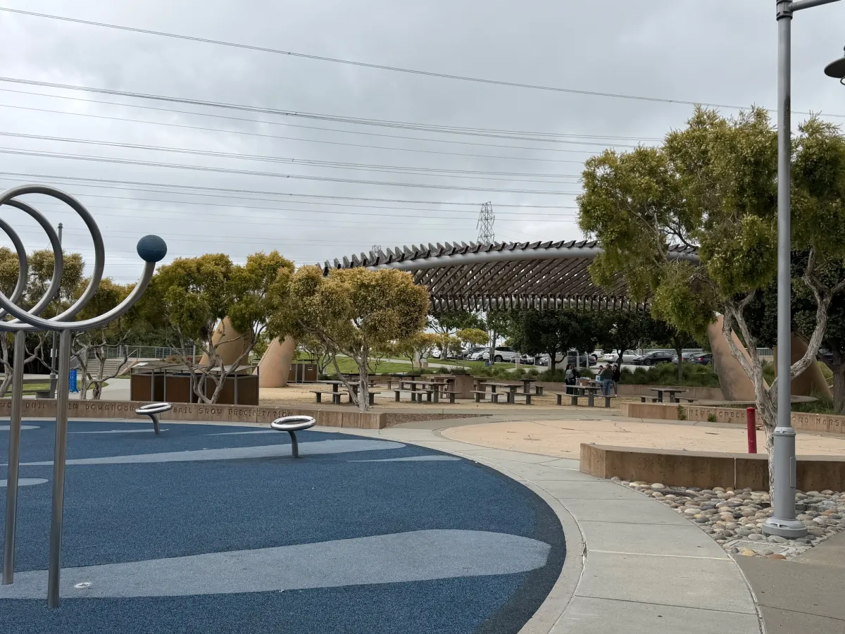 Picnic pavilion next to playground and splash pad