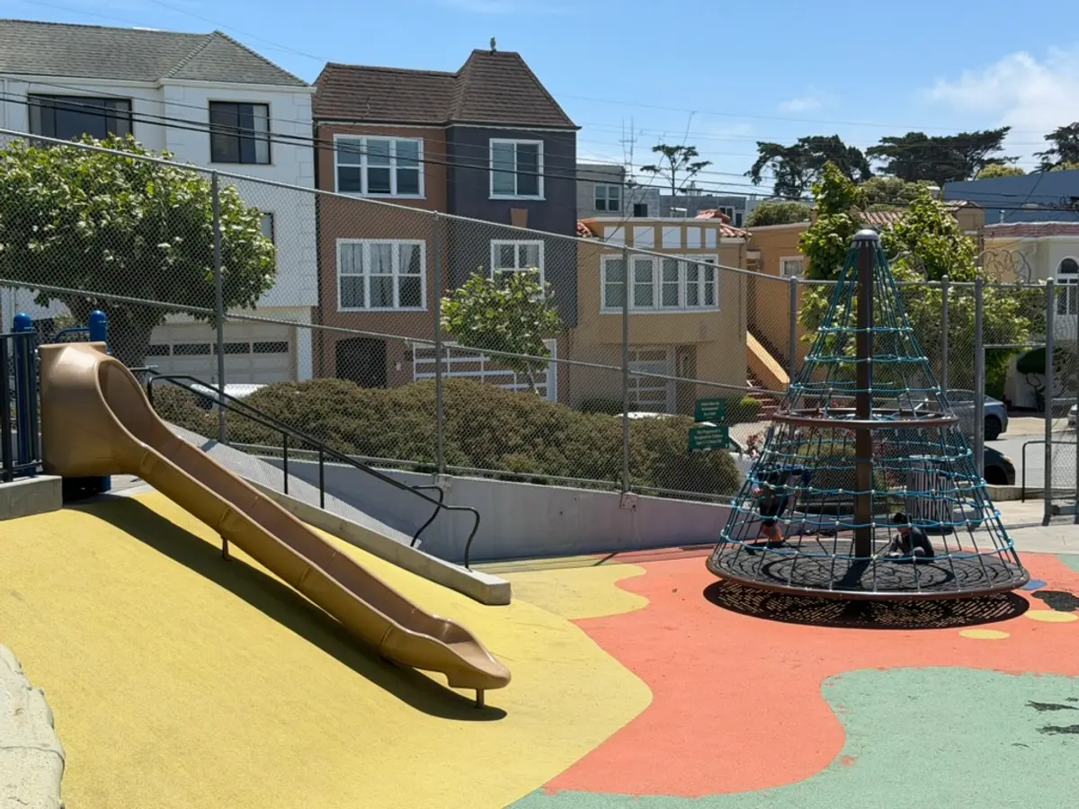 Big slide by the side of the playground