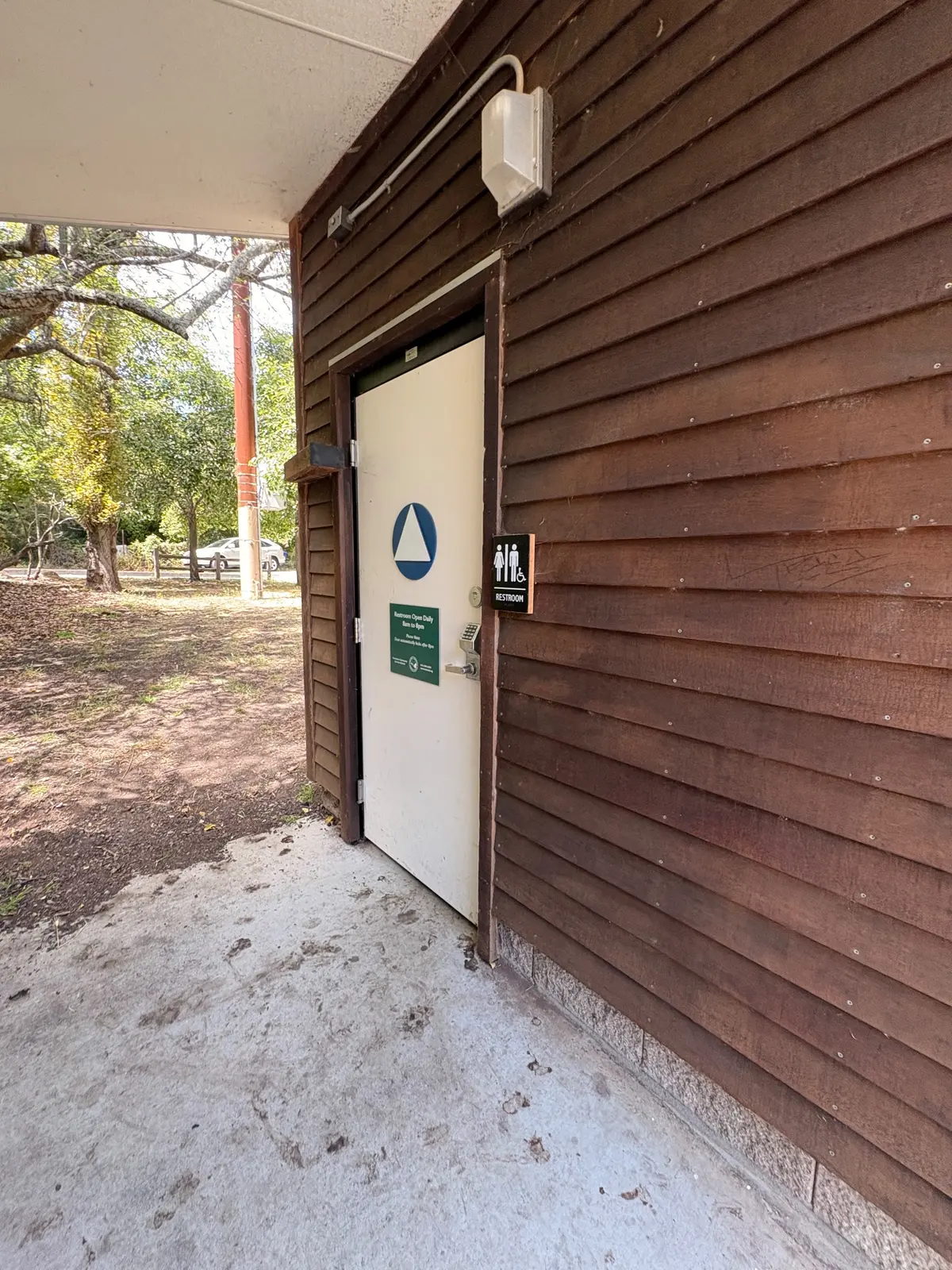 Bathrooms are a small walk and near tennis courts