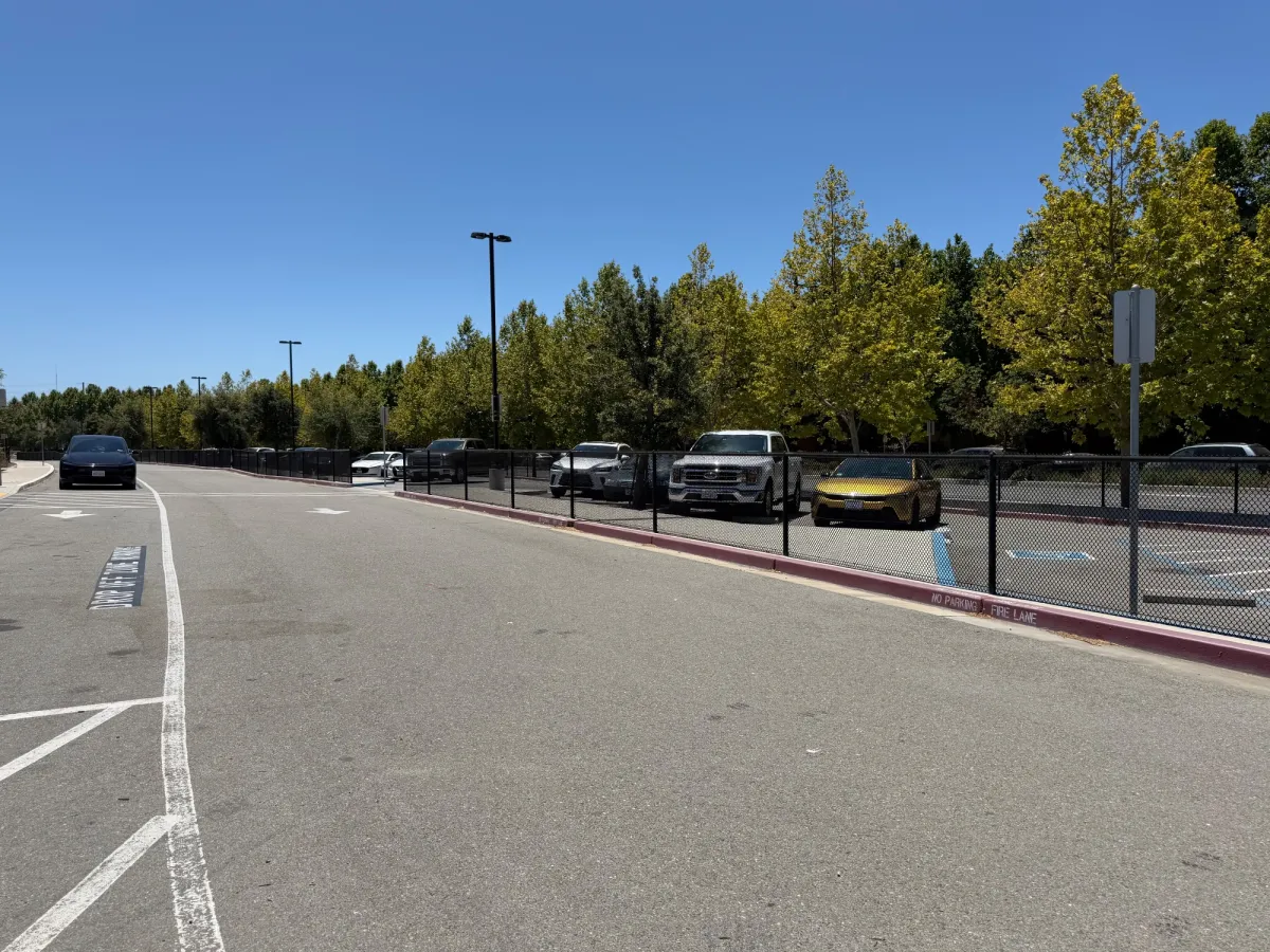 Parking lot is on the smaller side, long narrow strip of spots available