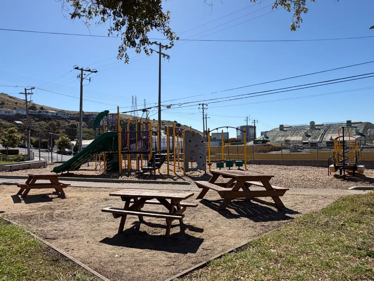 2 picnic tables are scaled down for child sizing