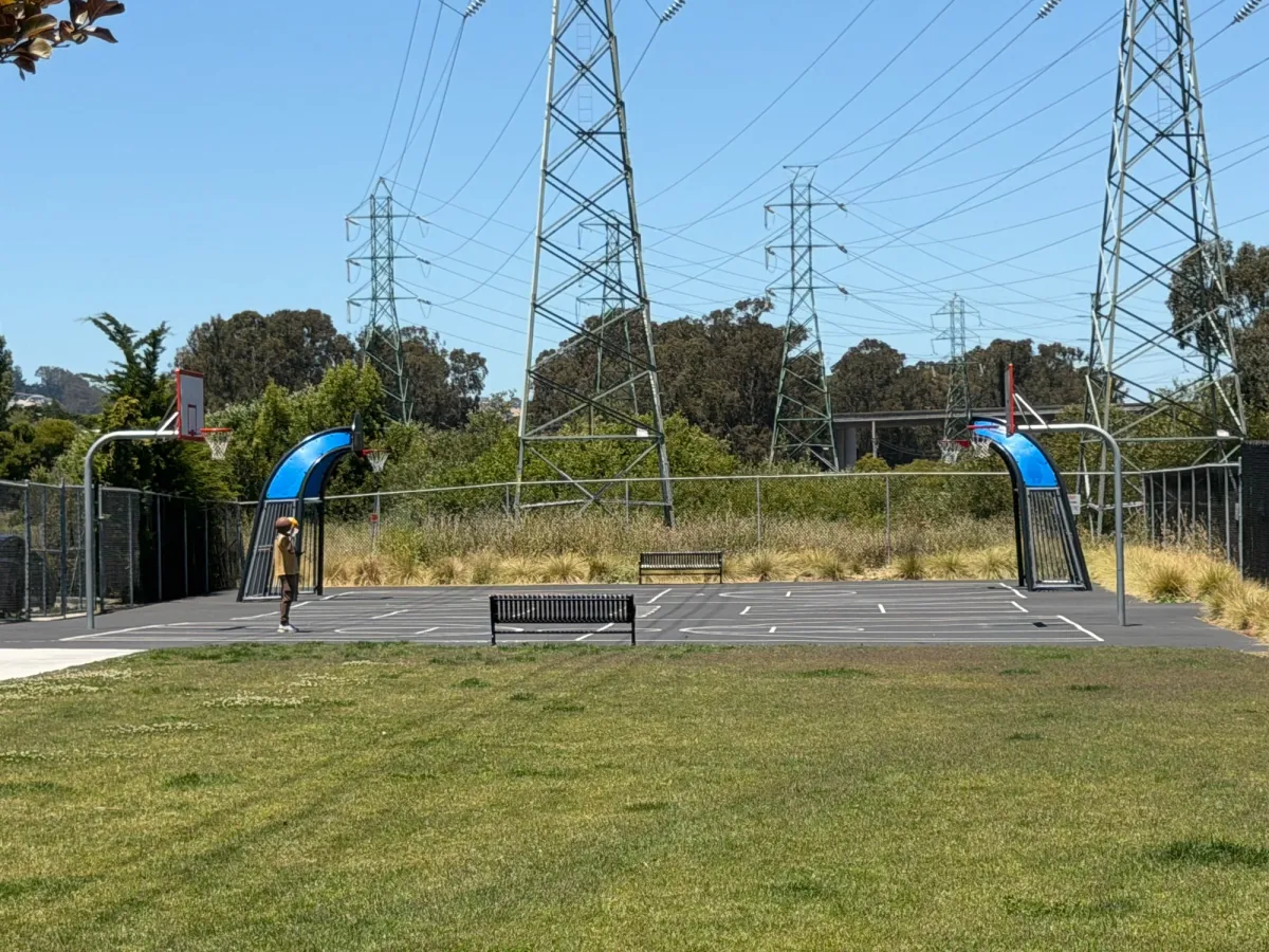 Basketball court nearby playground