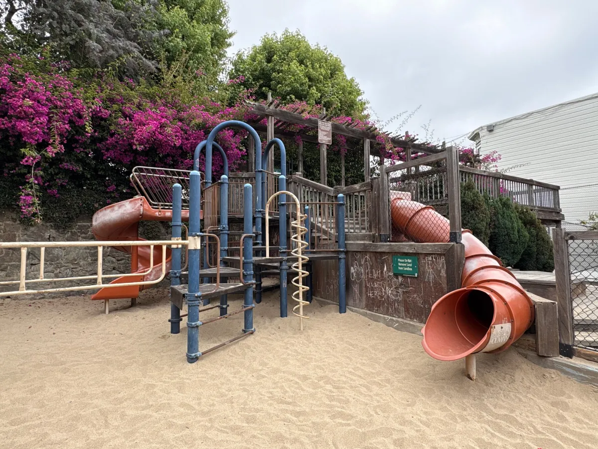Playground is nestled into the hill and sandpit