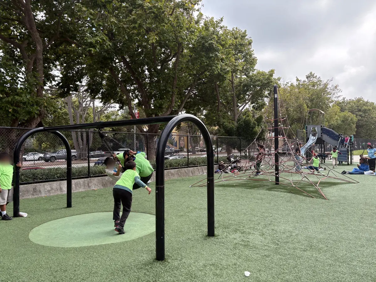 Tire swing amongst the climbing structure and main playground