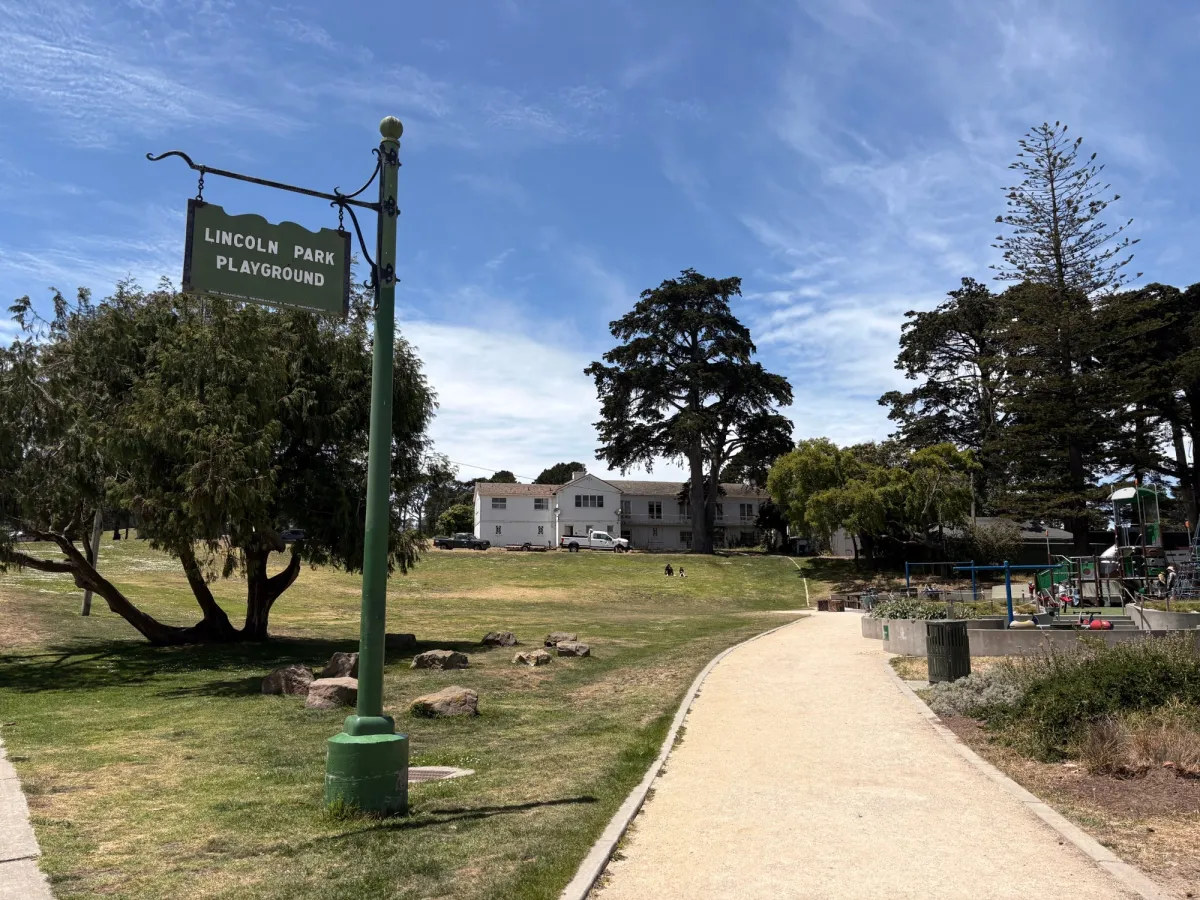 View from the entrance of the park. Not fenced, but safe for kids to run around