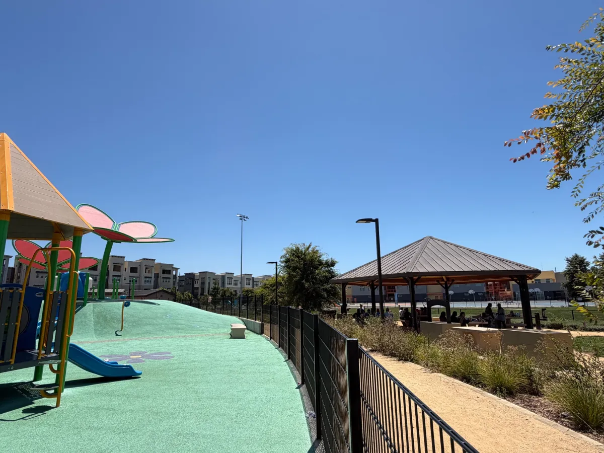 Fence enclosure fully surrounds toddler area