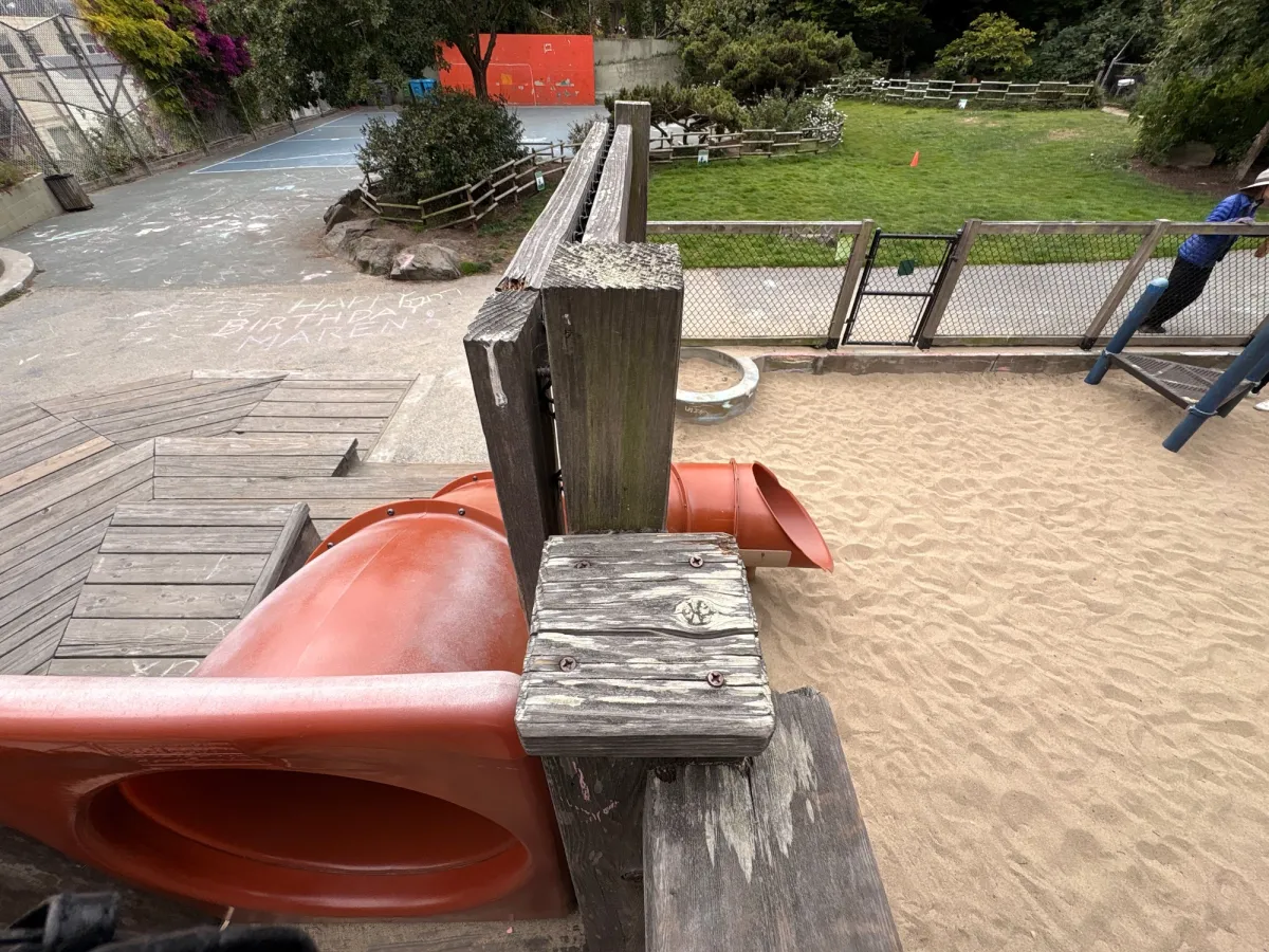 Slide down into the sand pit