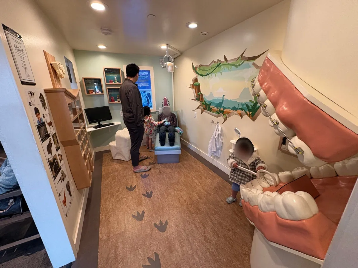 Pretend dentist office for kids to learn how to floss and brush