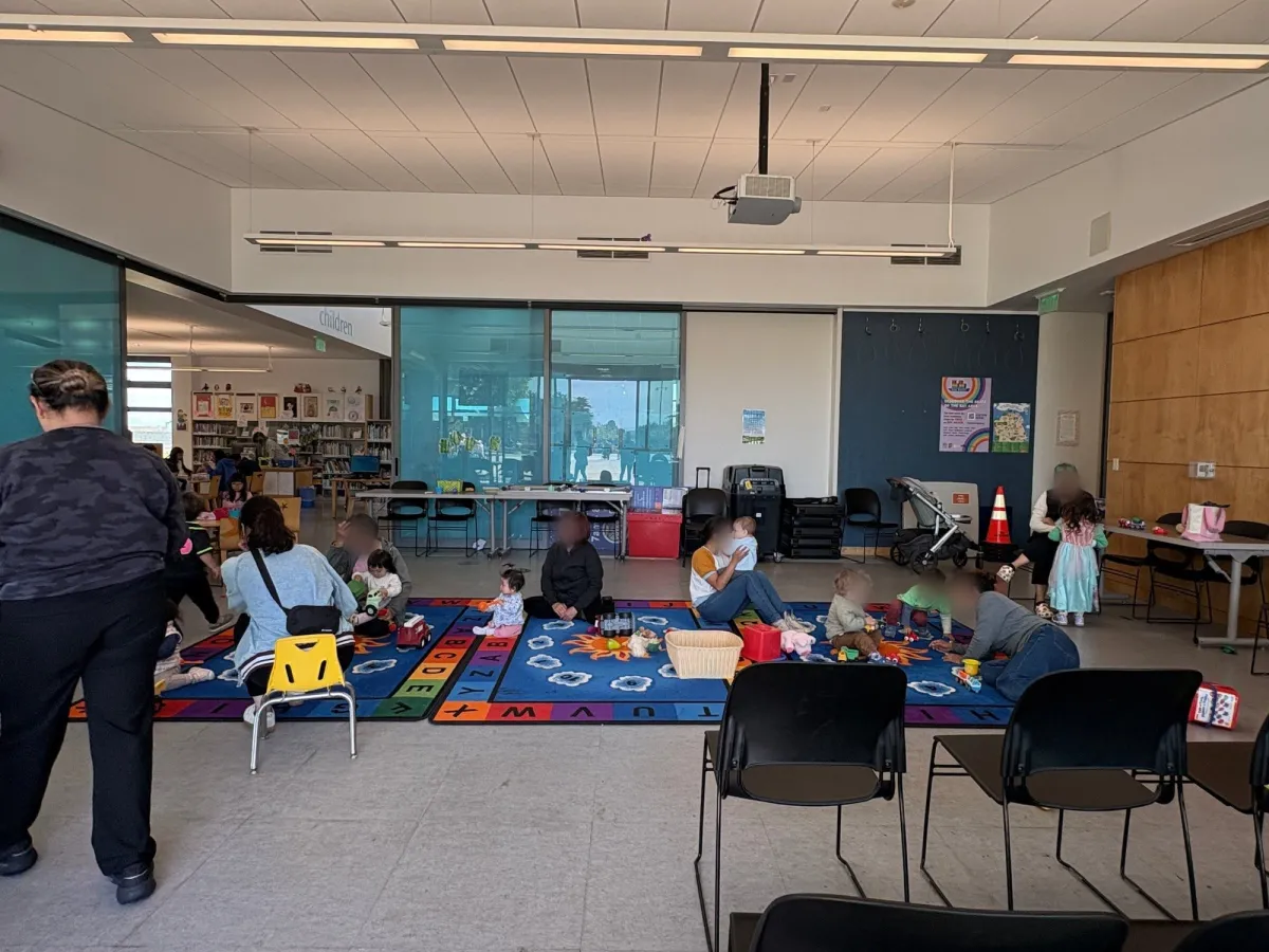 Infant-friendly area in the Library, opens up to the outdoor so your other kiddo can run in and out