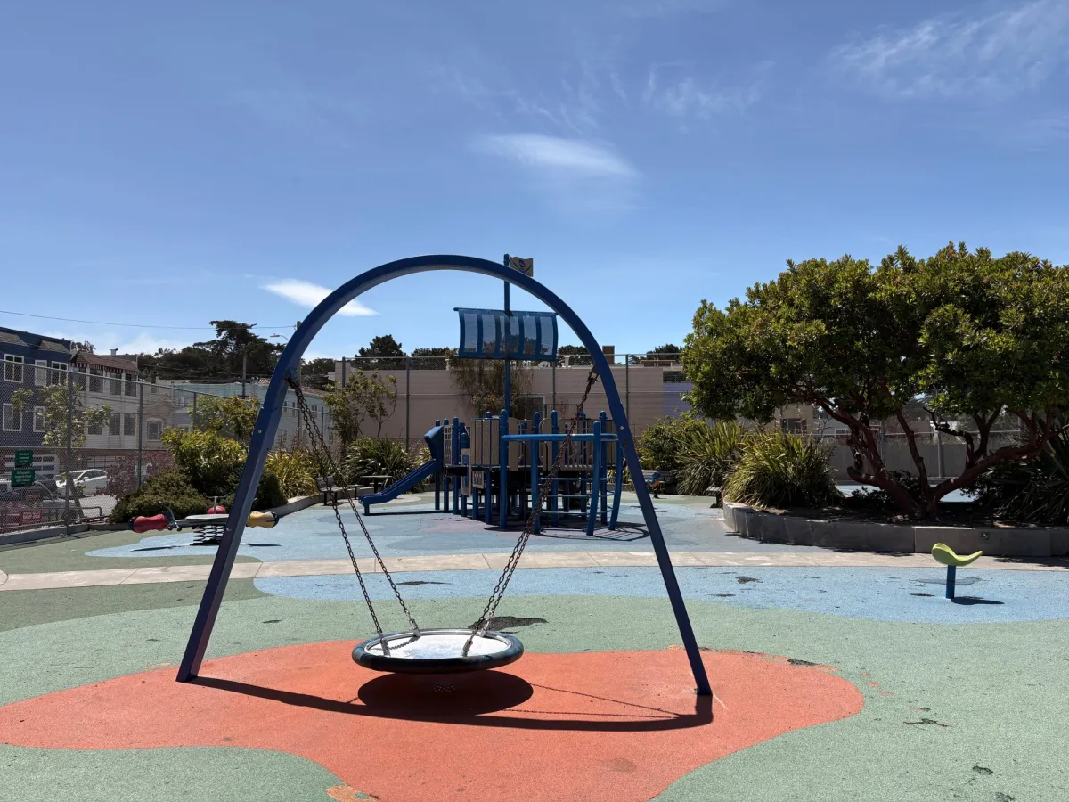 A flat swing, spinners, and three person teeter totter