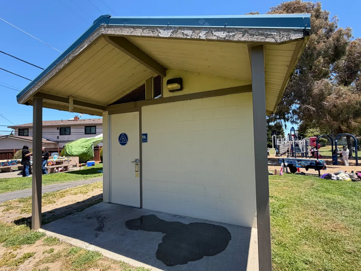 Single bathroom available next to playground