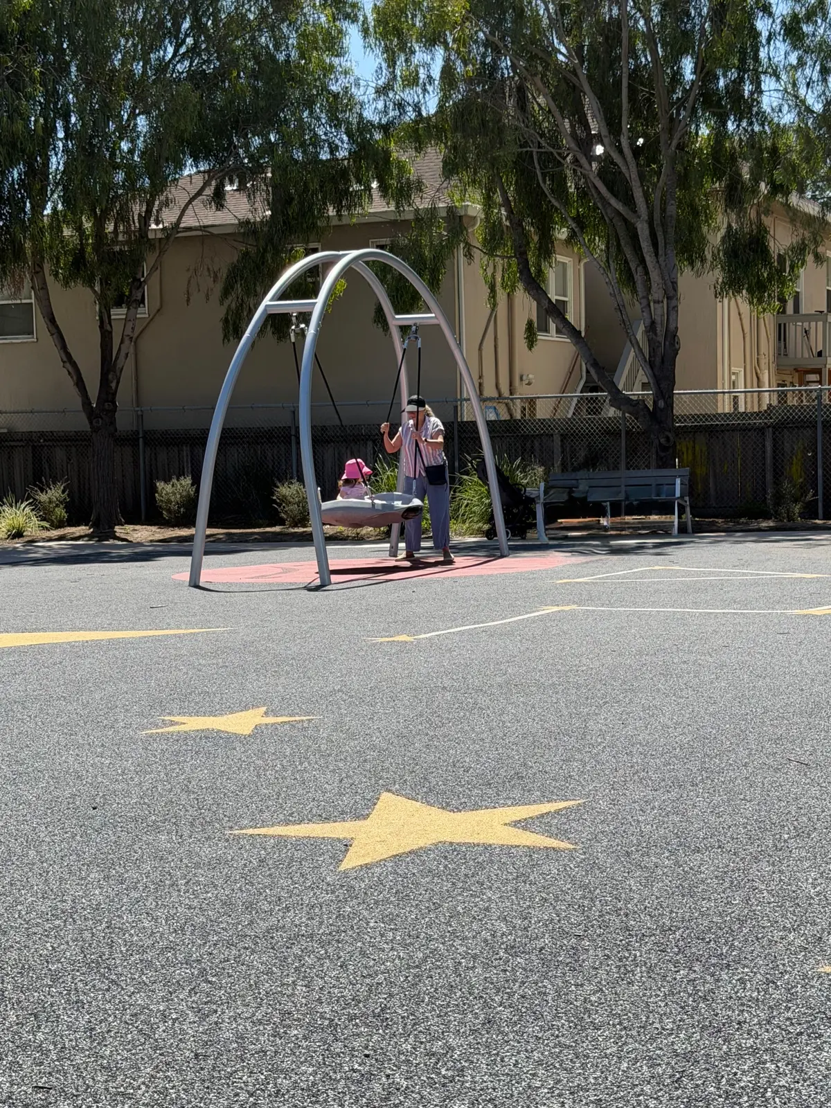 Saucer shaped swing