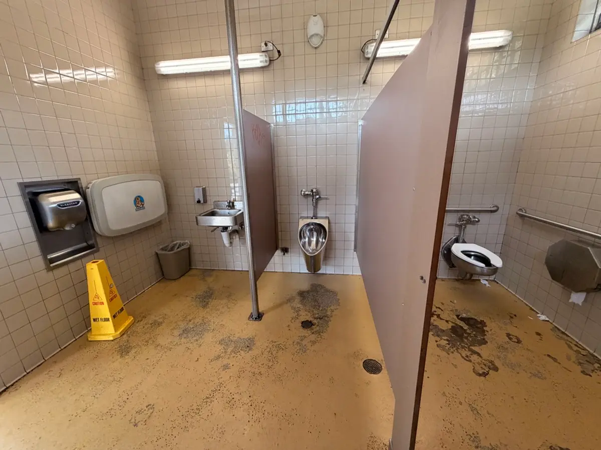 A little date but clean bathroom with changing table