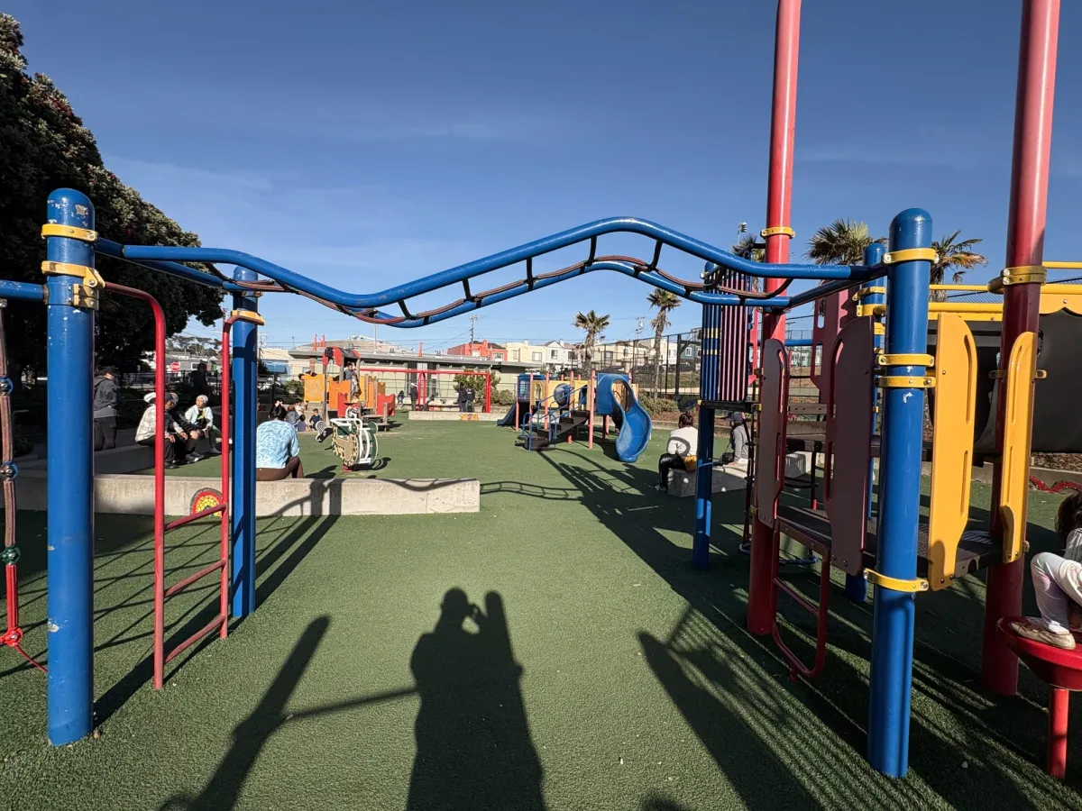 Wonky monkey bars to challenge bigger kiddos