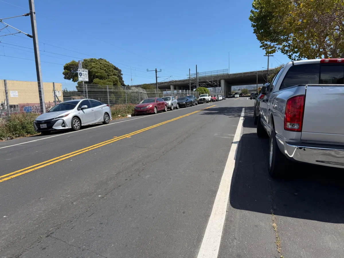 Street parking next to Caltrain tracks are busy even on a Monday afternoon.