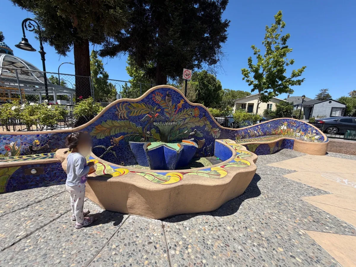 Gorgeous fountain and bench seating in playground