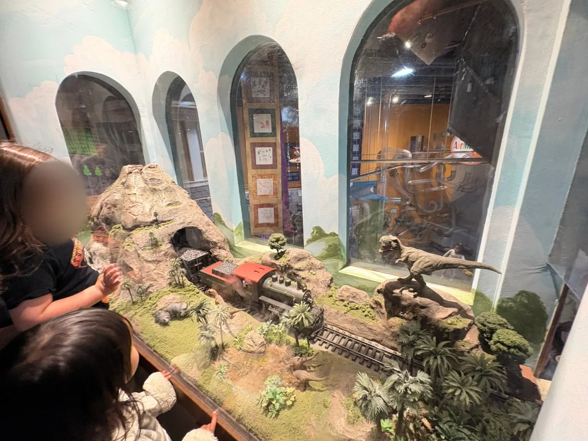 Interacting with Trains on tracks that move around the top floor