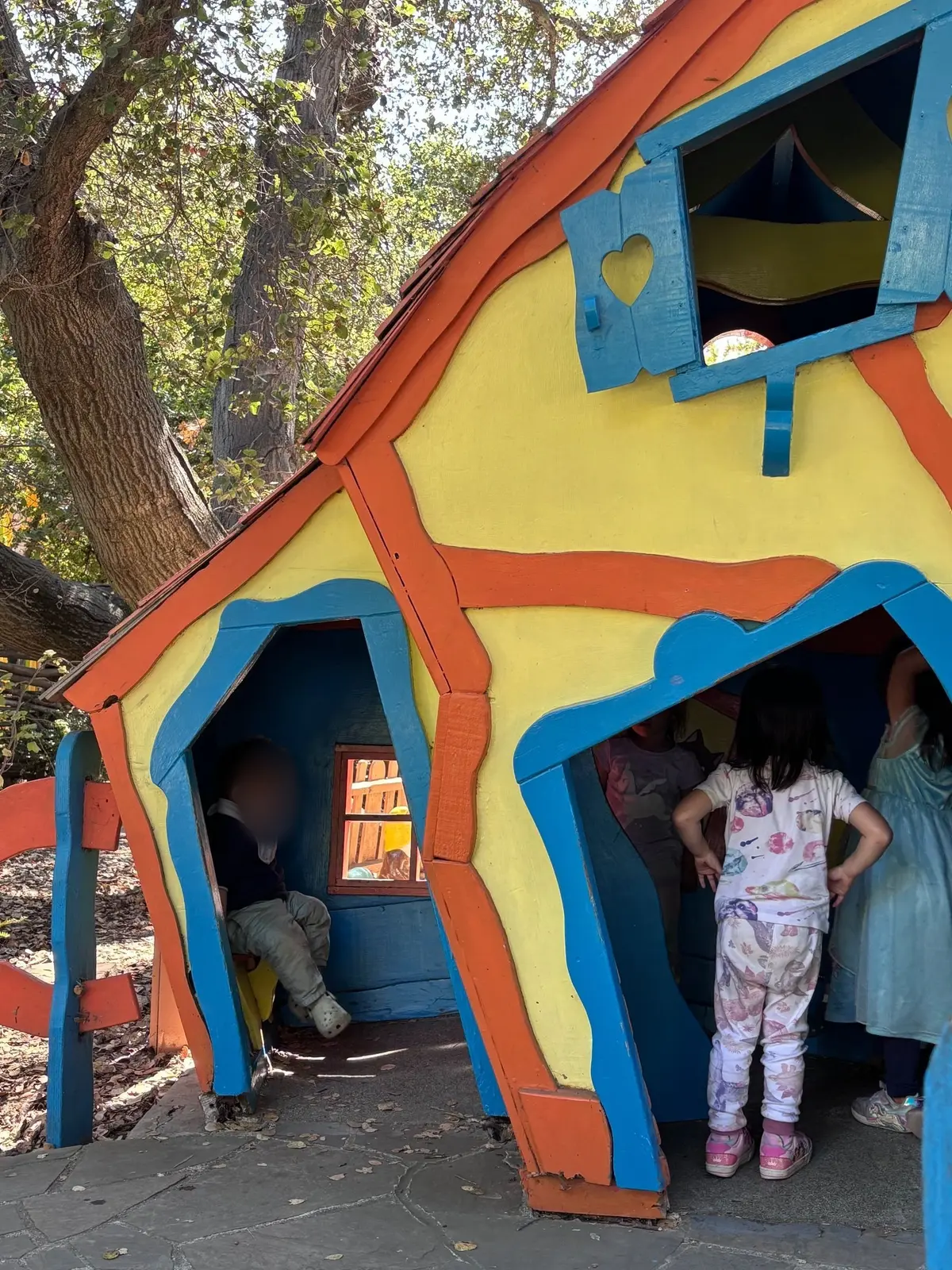 Cute little playhouses scattered throughout the park