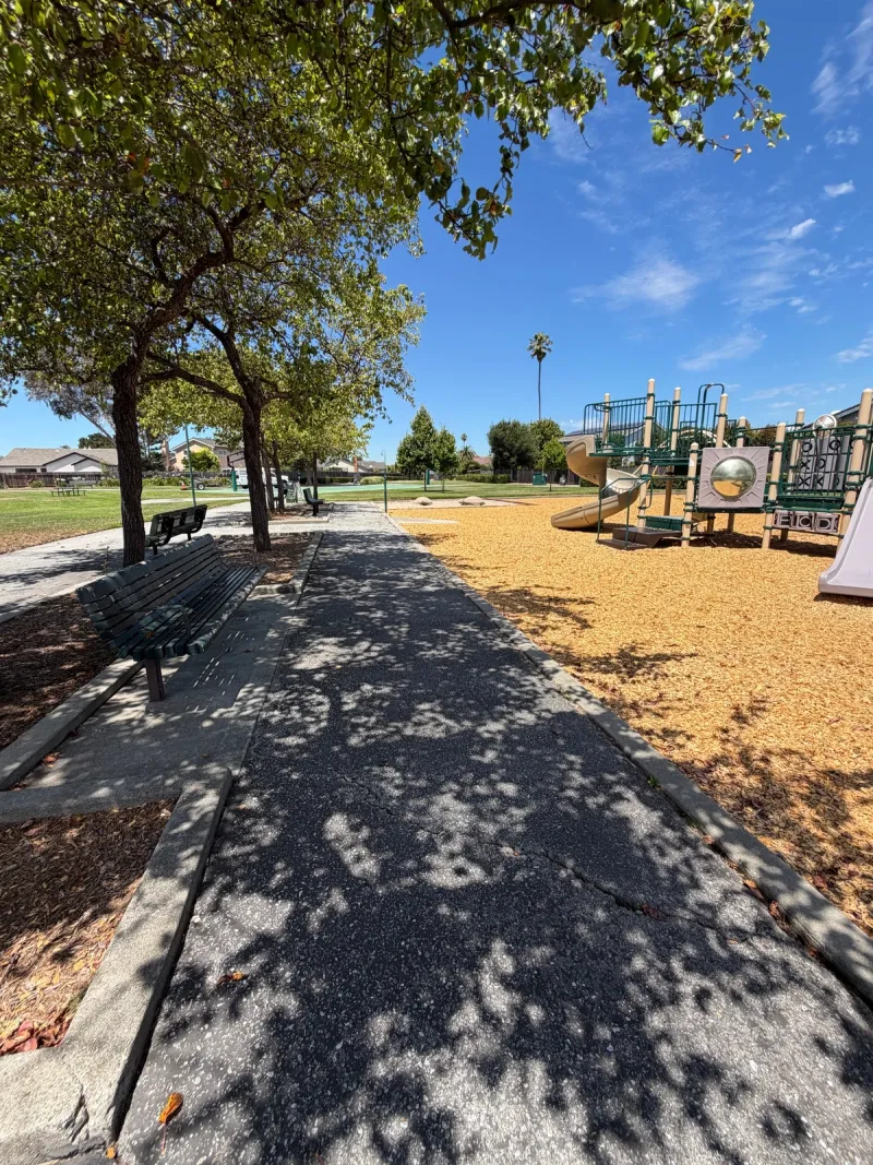 Lots of shaded seating in front of playgorund